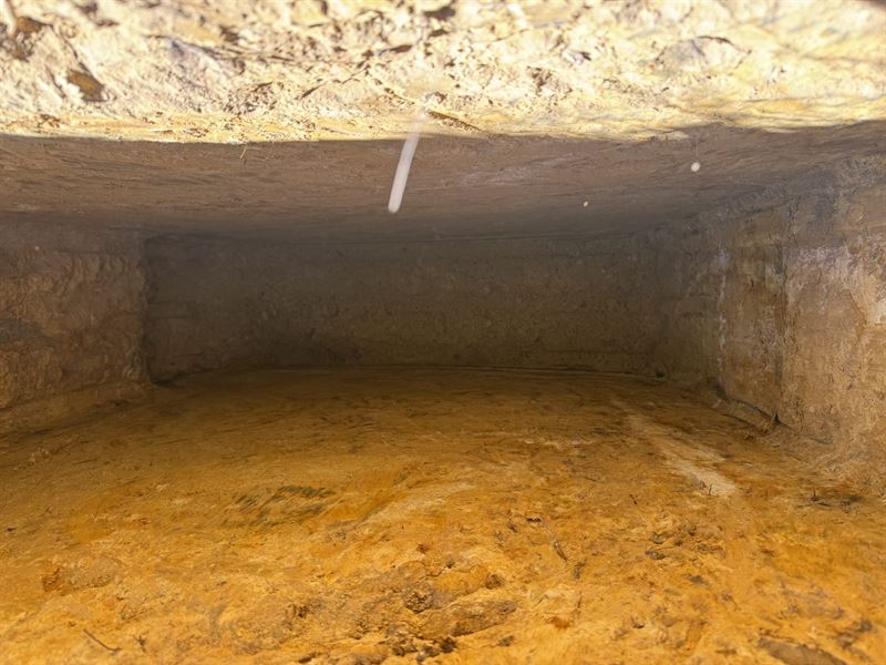 Deep trial pit excavated through clay into chalk